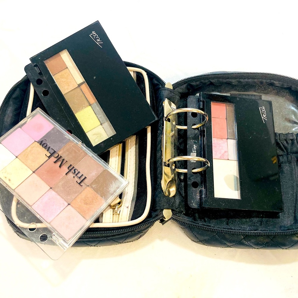 TRISH MCEVOY LARGE PLANNER FULL OF BARELY TOUCHED PRODUCTS.